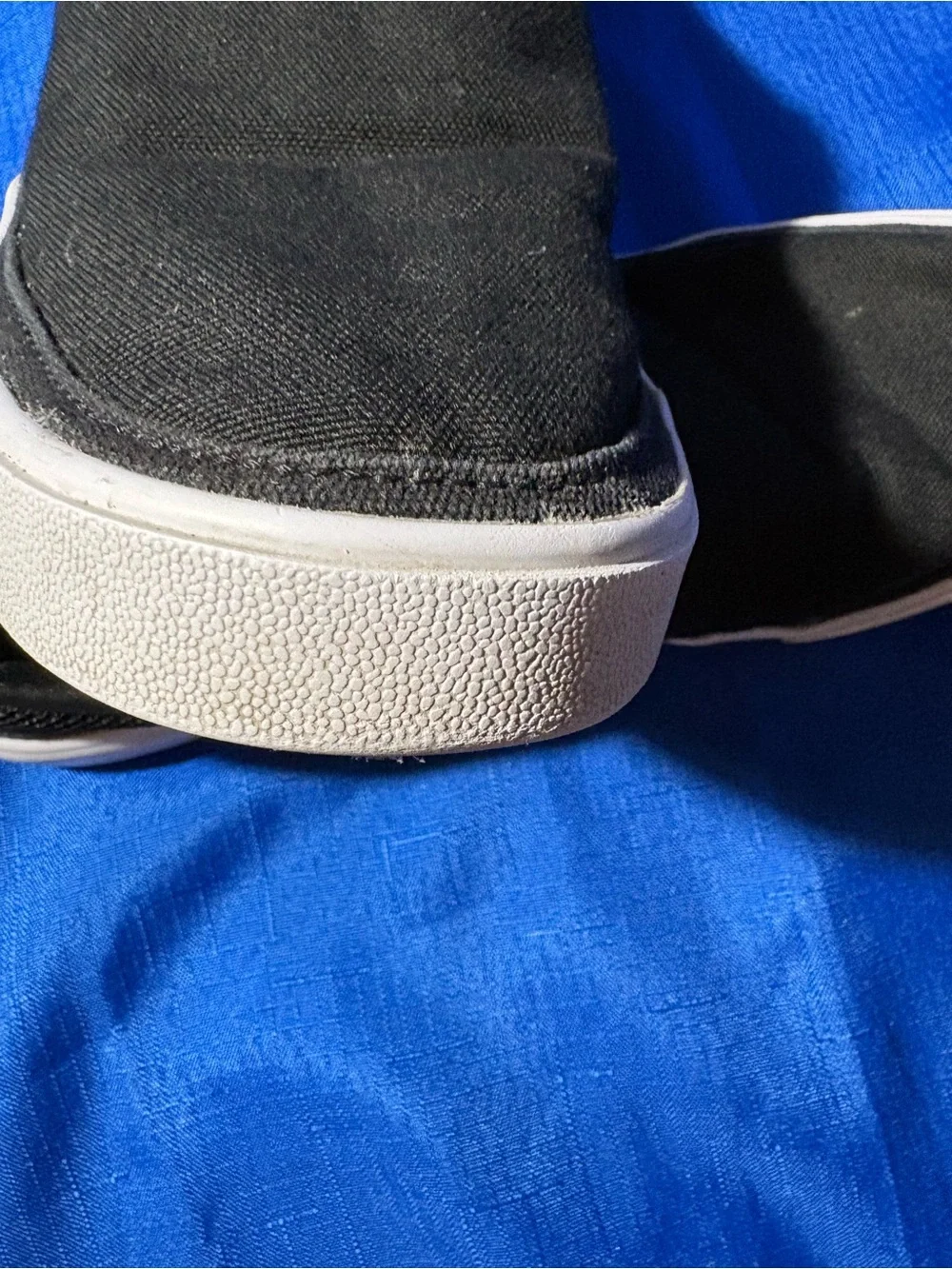 Nike Black Slip-On Canvas Sneakers with White Swoosh